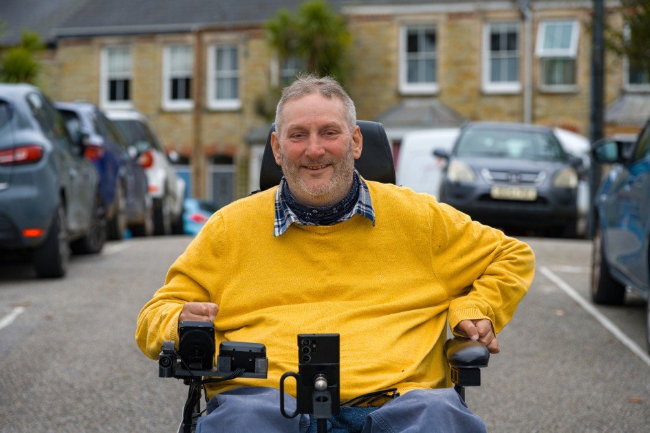 Steven Webb Cornwall councillor in a yellow jumper